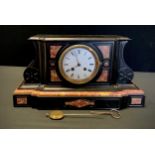 A 19th century Belge-Noir mantel-clock, white enamelled dial, gold-coloured roman numerals, French
