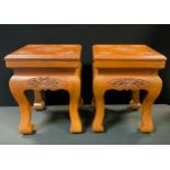 A pair of Japanese carved square jardinières or plant stands, each with floral tops and friezes ,