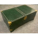 A rectangular leather covered coffee table ottoman, brass bound corners, 39cm high, 102cm long, 61cm