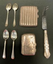 An Edwardian silver cigarette case, Birmingham 1906, another 1902; four silver tea spoons etc, 5.