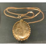 A 9ct gold opal locket pendant necklace, fancy link chain , 13.8g gross