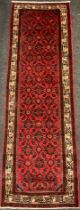 A North West Persian Malayer runner, the hand-knotted field with all-over design of repeating