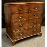 A 19th century mahogany chest of drawers, slightly over-sailing top, above pair of short, and