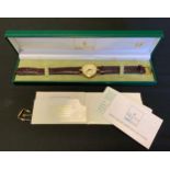 A mid 1990s Gucci quartz dress watch in original box with paperwork dated 23/8/96, cream dial, Roman