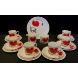 A Wedgwood Susie Cooper ‘corn poppy’ tea set for six including milk jug and sugar bowl.