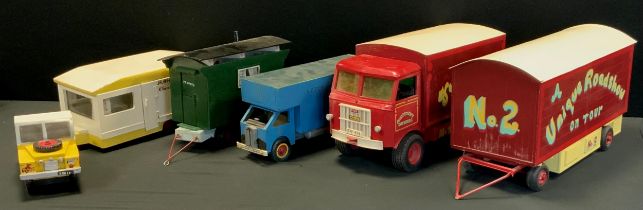 A Scratch Built Wooden model of a Fairground wagon and trailer, Fun Fair on Tour, in red, yellow and