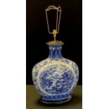 A large Chinese blue and white moon flask table lamp, decorated with Dragon and Phoenix