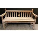 A pitch pine garden bench, 91cm high x 149.5cm wide x 57.5cm deep.