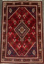 A North west Persian Josheghan rug / carpet, central diamond-shaped medallion within a field of