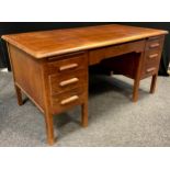 A mid century oak twin pedestal desk, by Abbess, rounded rectangular top, single long drawer to