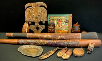 An Australian didgeridoo, another, carved wall mask, drinks flask, flute, shoes, etc