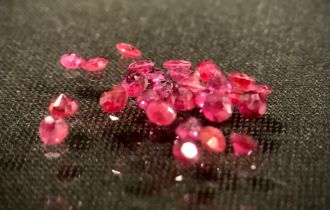 Loose Gemstones, twenty eight round cut rubies, total estimated stone weight approx 1.71ct.