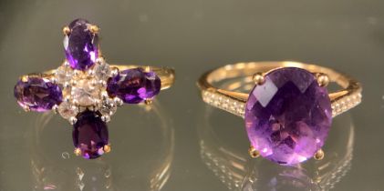 An amethyst and white zircon cross cluster ring, 9ct gold shank, size N, 2.7g gross, another oval