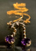 An Edwardian diamond, amethyst and seed pearl necklace, tied ribbon box set with twenty six old