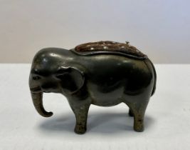 A Victorian/Edwardian novelty silver plated pewter pin cushion, as an Elephant standing, 5.5cm long.