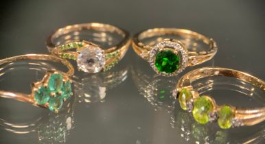 A 9ct gold peridot and zircon ring, 9ct gold shank, size M, 2.3g gross; others garnet, emerald, Cz