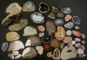 Geological interest - a collection of Agate slices, with some pairs, various colours, some with