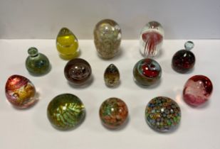 Glass paperweights - an Isle of Wight glass dump, large stretched-bubble inclusions with suspended