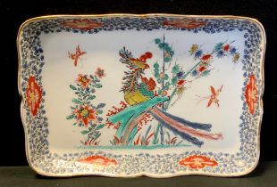 A 20th century Chinese trinket dish, decorated with a phoenix and a border of flowers and foliage,