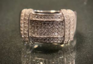 A cubic zirconia signet ring, pave set with white stones, stamped 925, size P, 6.9g gross