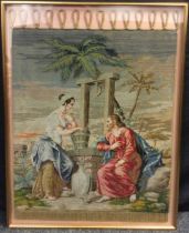 A Victorian embroidered panel, Jesus and Mary at the Well, 118cm x 85cm framed