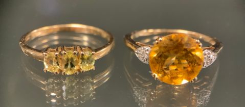 A 9ct gold orange citrine and diamond dress ring, 9ct gold shank, size N/O; a yellow stone