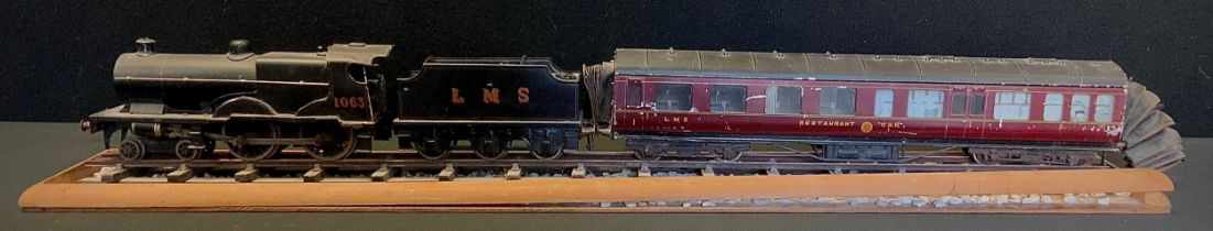 A Hornby O gauge 4-4-0 locomotive and tender, LMS black livery, Rn 1963, with passenger coach