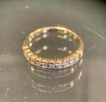 A modern diamond half eternity ring, set with ten round brilliant cut diamonds, total 0.33ct, 9ct