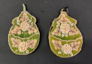 A pair of Victorian embroidered bead work pockets as a pin cushions, 18cm high (2)