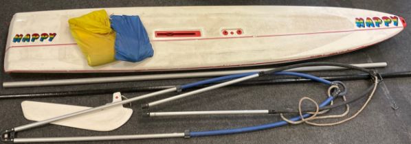 1980/1990s windsurfing set including; deck, mast, main sail, rudder, etc. 375cm long x 70cm wide