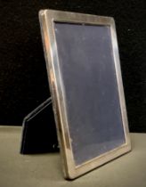 An Elizabeth II silver rectangular easel photograph frame, 20.5cm high, Mappin & Webb, Sheffield
