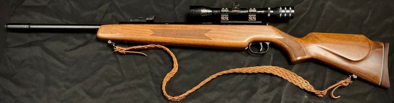 A Diana model 52 .22 calibre side lever action air rifle, serial no 02106917, textured stock,