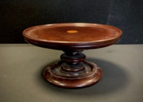 An Edwardian mahogany and marquetry circular lazy Susan, of small proportions, dished circular