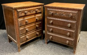 A pair of oak bedside chests, each with four drawers, carved top drawer panel, turned legs, 77cm