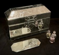 A rectangular mirrored jewellery casket, sloping top, lined interior, 25cm high, 37cm wide, 15cm