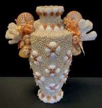 Laura Gonzalez - a hand embellised Coral and shells encrusted vase, all over decorated with assorted