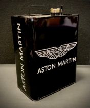 An oil can, embossed with Aston Martin Logo and script, in silver, black ground, 34cm high