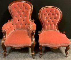 A Victorian mahogany balloon-back armchair, deep-button upholstered back and arms, upholstered