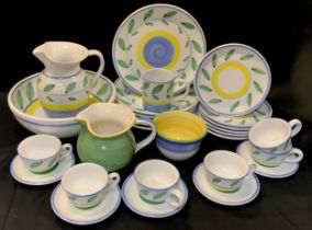 An Italian pottery part table service for six including; six large dinner plates, six smaller, six