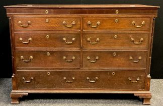 A George III oak Lancashire Mule Chest, hinged top above two pairs of faux drawers, two short