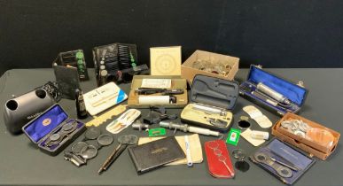 Ophthalmic Equipment - a 1940s R Whiteley retinoscope, cased, Apical Curves scale, Rosen and other