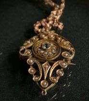 An Edwardian seed pearl and topaz pendant brooch necklace, floral mount and fancy link chain, both