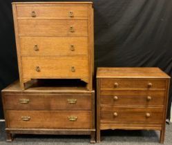 An early 20th century oak low chest of drawers, two long drawers, carved apron, 61.5cm high x 99cm