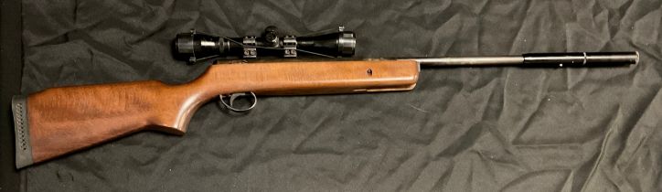 A BSA .22 calibre break barrel action air rifle, serial no 815475, wooden stock, 106.5cm long,