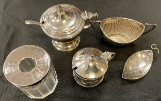 A George III silver leaf form caddy spoon, London 1797; boat salt, mustard etc, 3.70zt gross (5)