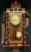 A 20th century wooden wall clock, twin holes, eight-day movement, 53cm high