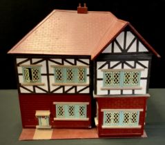 A mid 20th century two storey dolls house, approx 58cm x 65cm x 48cm.