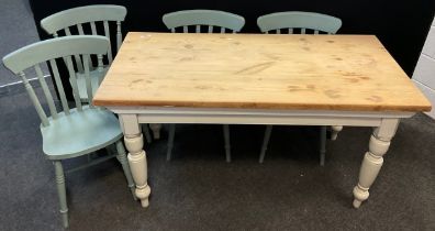 A pine kitchen table, thick plank top, white painted base, turned legs, 76cm high x 152cm x 75.