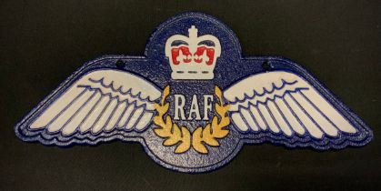 A painted cast iron RAF wings wall plaque 35cm wide