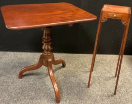 A 19th century mahogany tilt-top tripod table, rounded rectangular top, turned pedestal base, 73.5cm